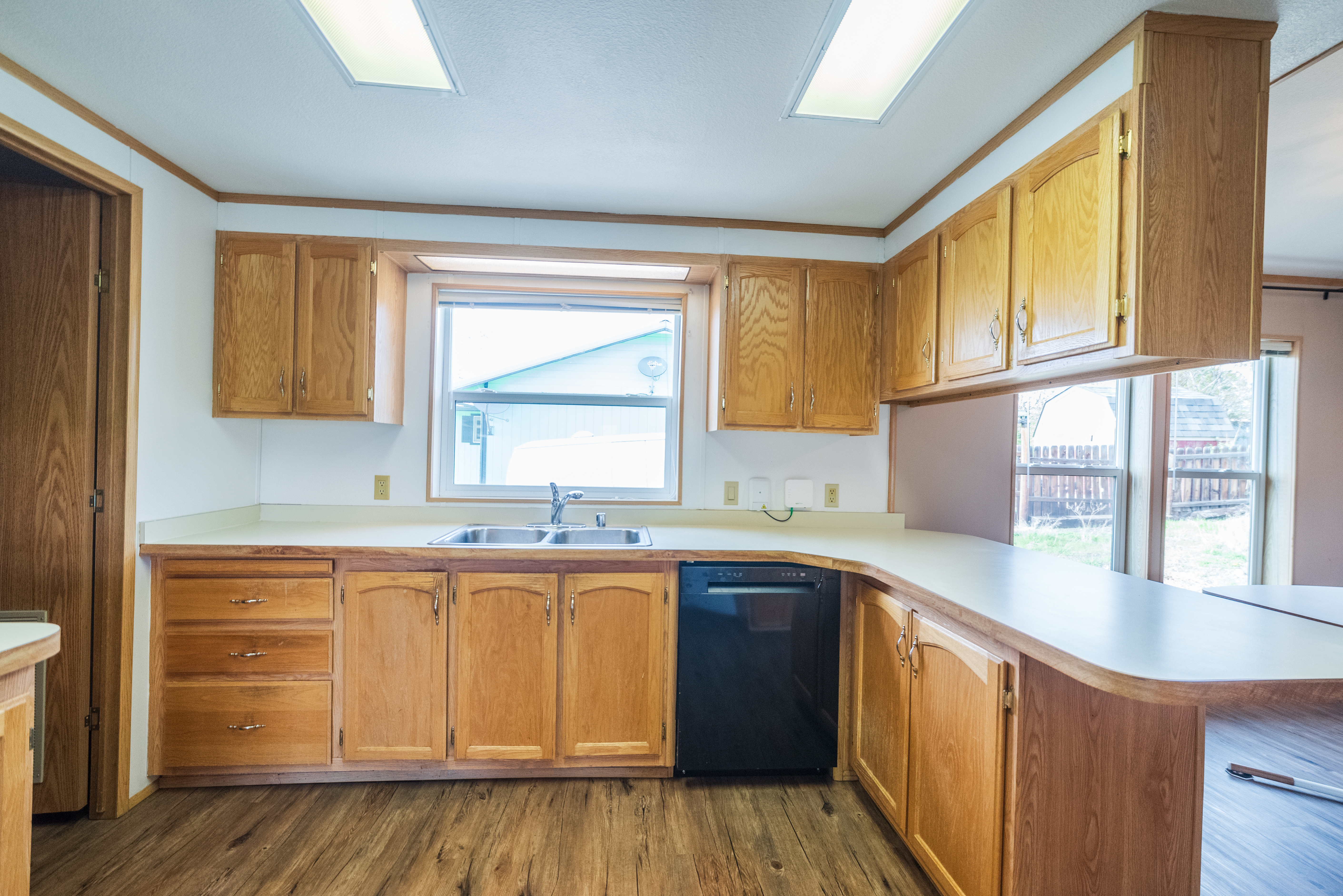 Moving boxes in an emptied apartment ready for cleaning